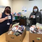 Staff with food boxes