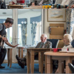 Man playing guitar in care home